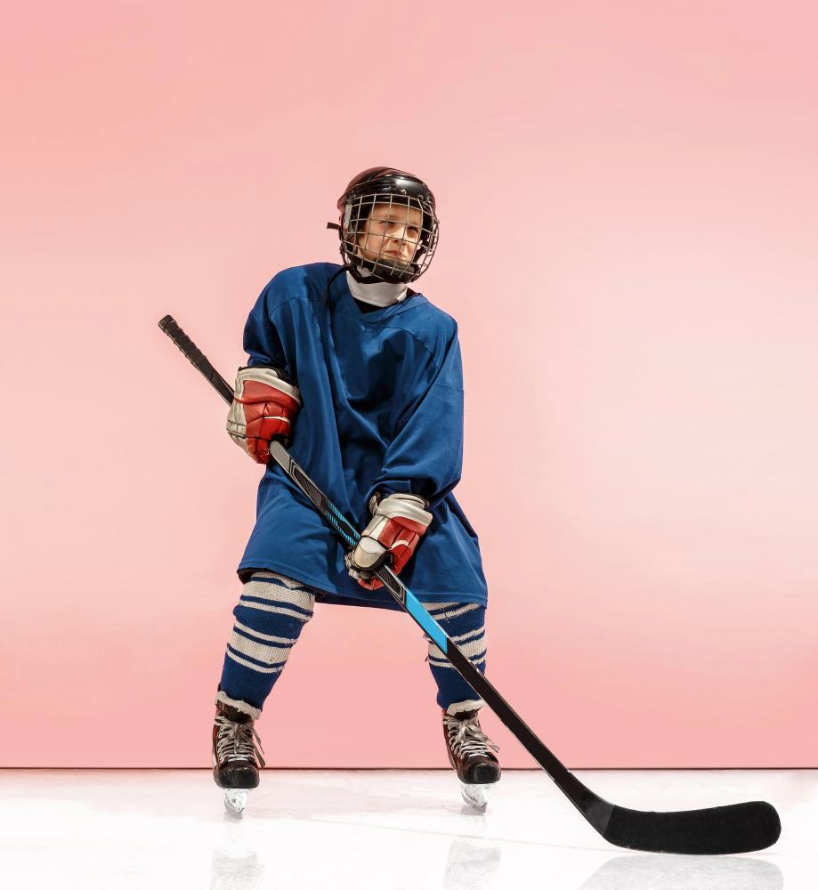 hockey player with equipment pink